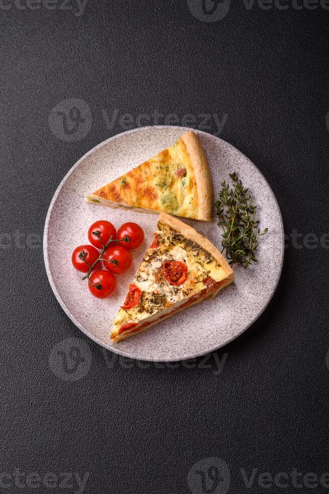Delicious quiche with broccoli, cheese, chicken, spices and herbs photo
