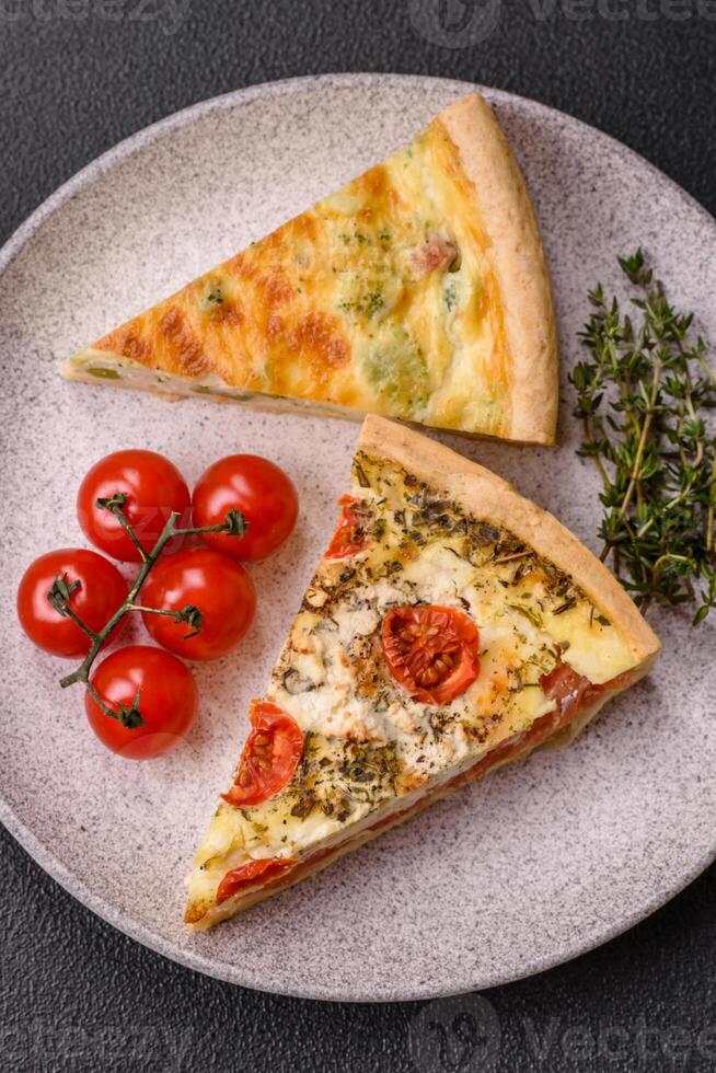 Delicious quiche with broccoli, cheese, chicken, spices and herbs photo