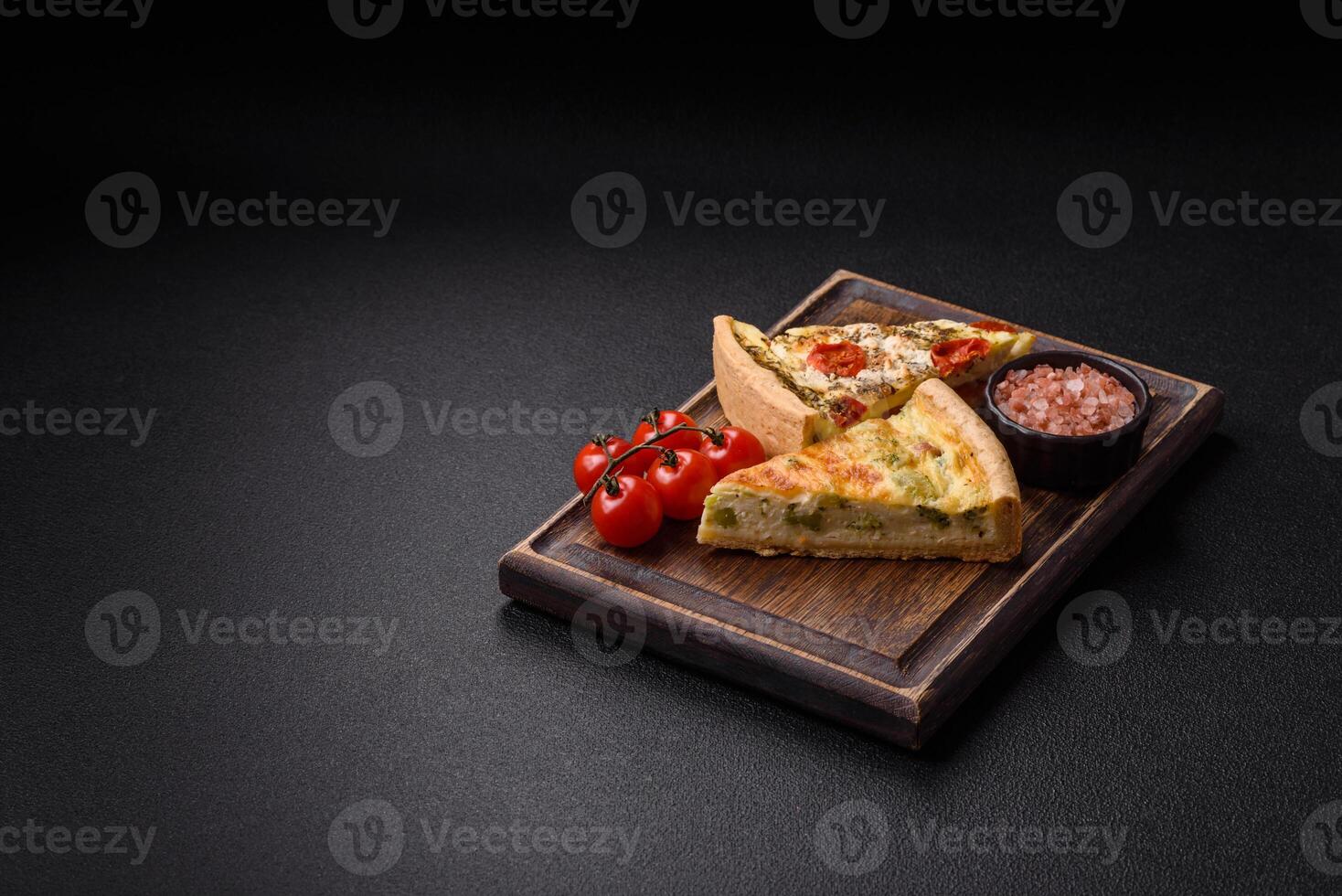 Delicious quiche with broccoli, cheese, chicken, spices and herbs photo
