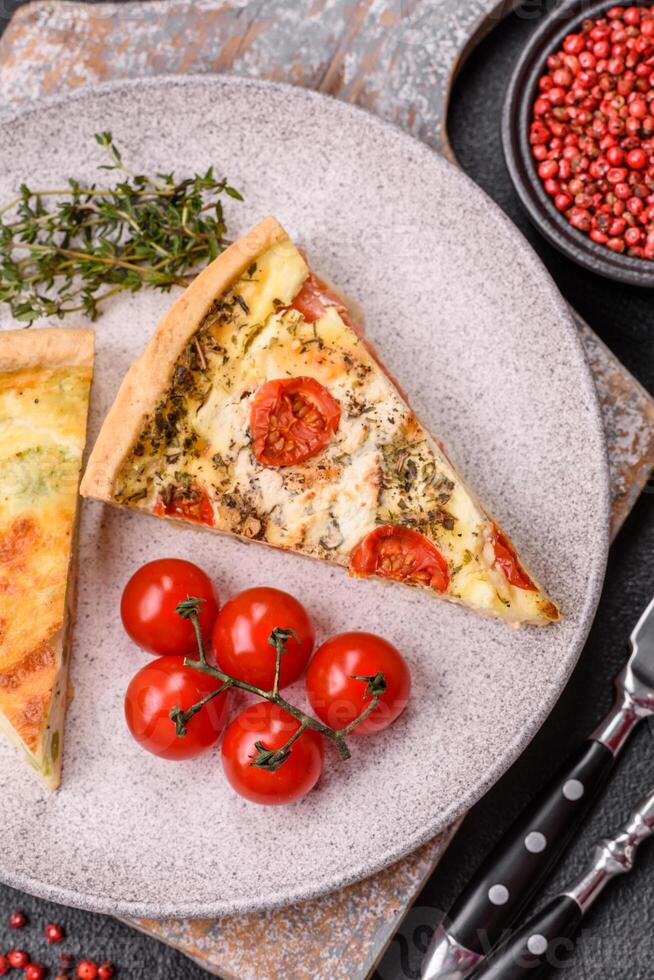 Delicious quiche with broccoli, cheese, chicken, spices and herbs photo