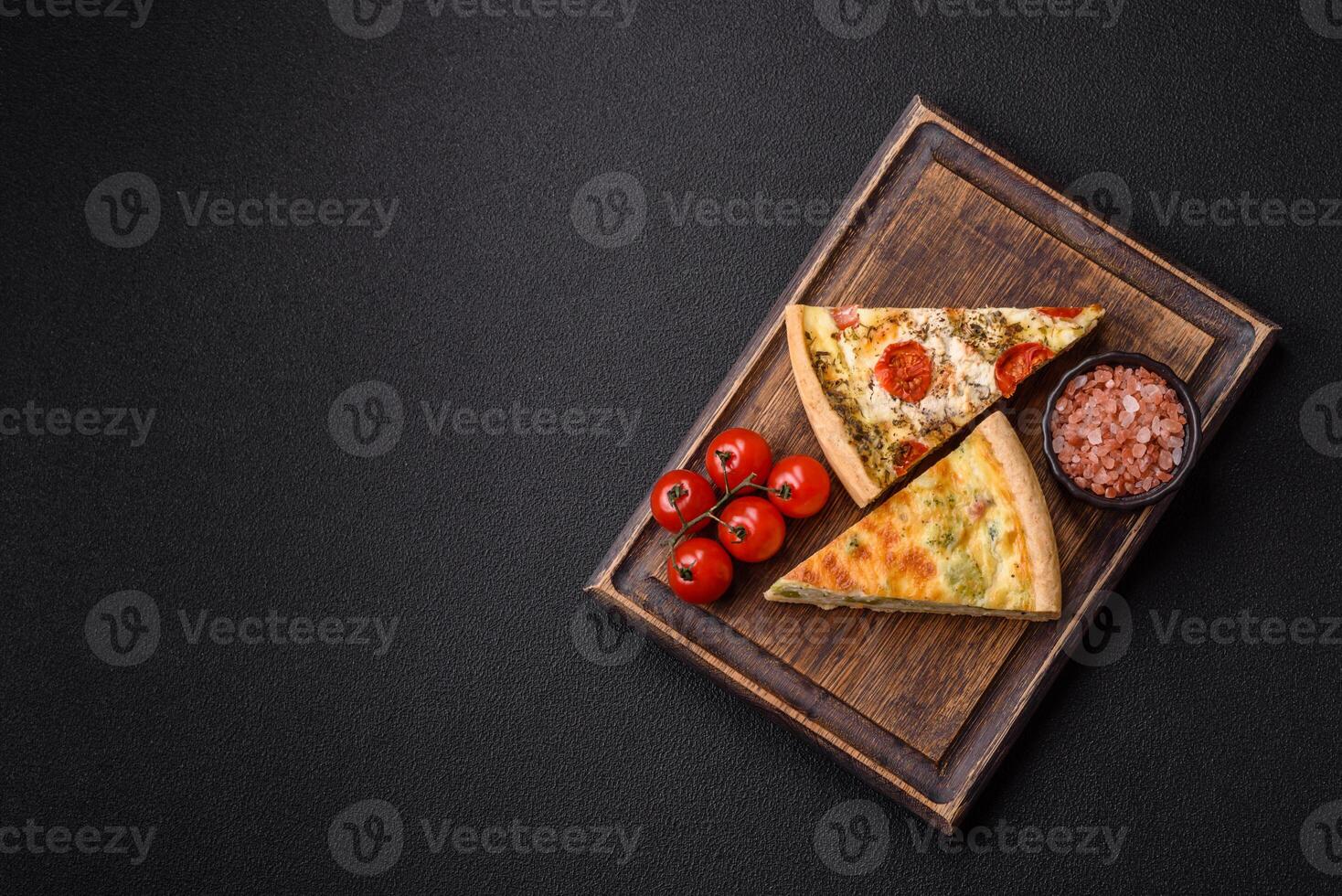Delicious quiche with broccoli, cheese, chicken, spices and herbs photo