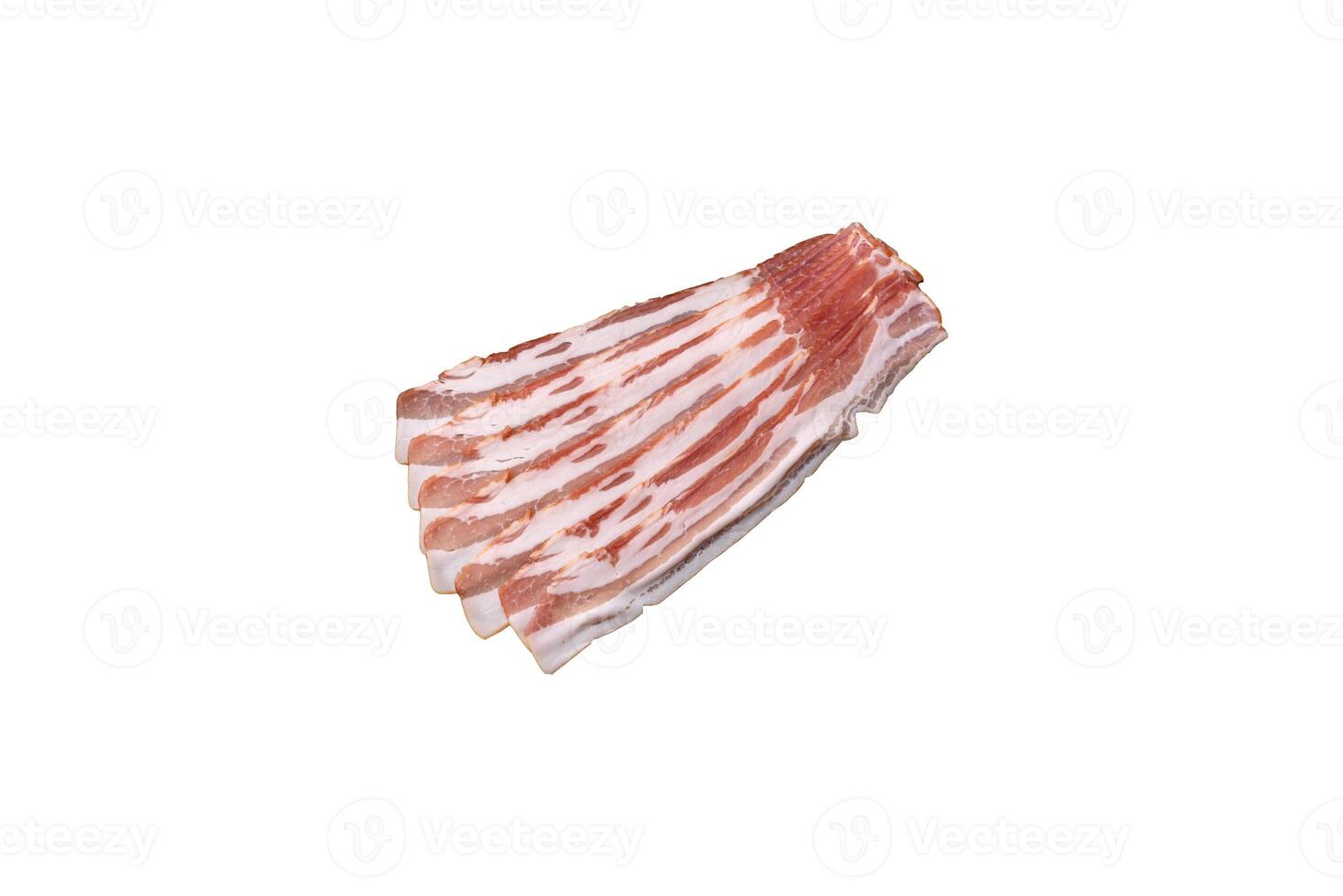 Fresh raw bacon sliced with spices and herbs photo
