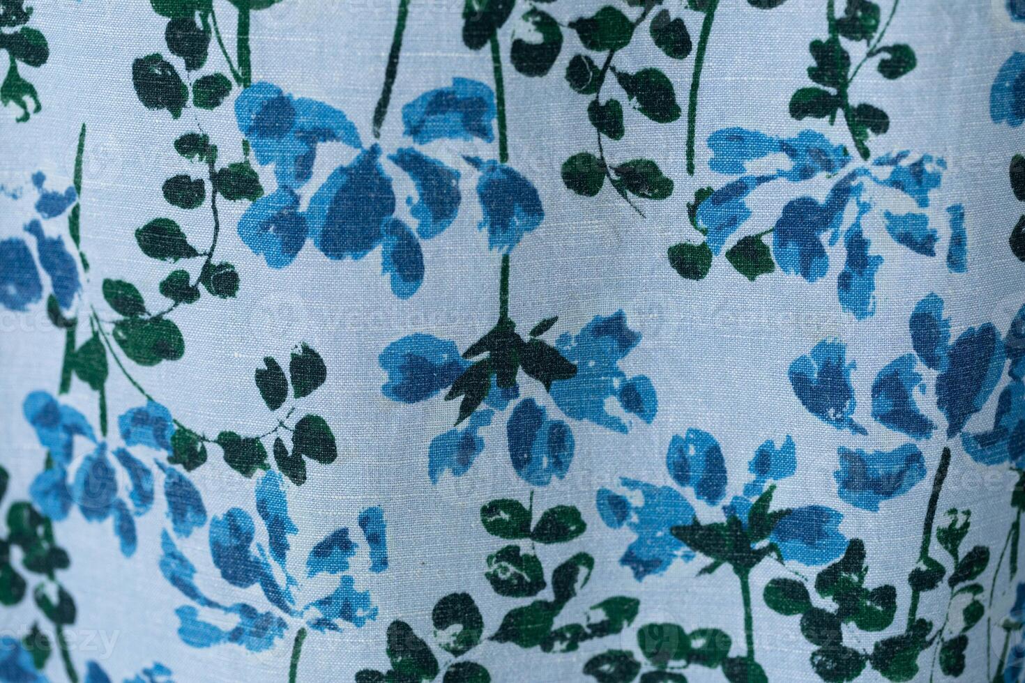 Textile pattern with floral ornament on fabric. photo