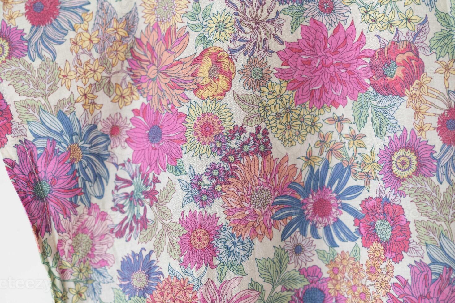 Textile pattern with floral ornament on fabric. photo