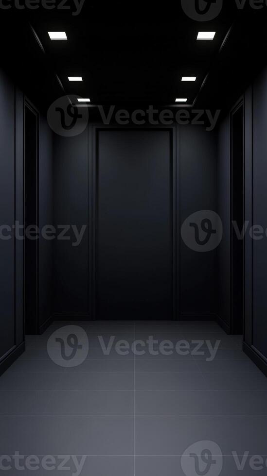 Modern black elevator with smooth walls and bright lighting photo