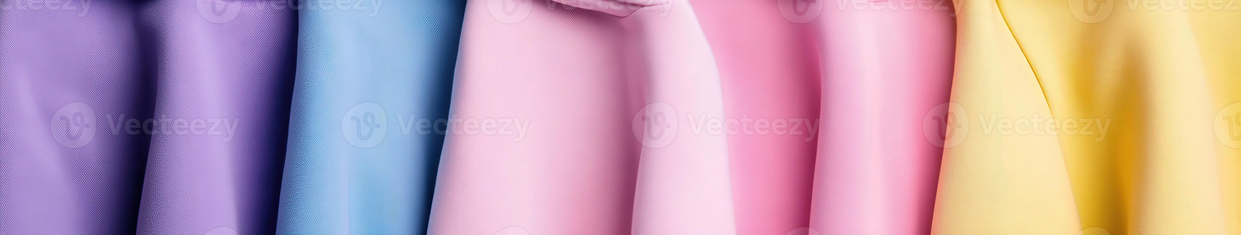 Soft pastels of fabric hanging together in a vibrant display photo