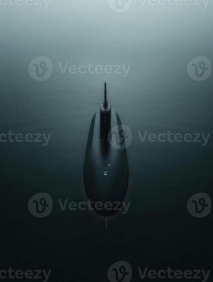 Submarine navigating through calm, mist-covered waters photo