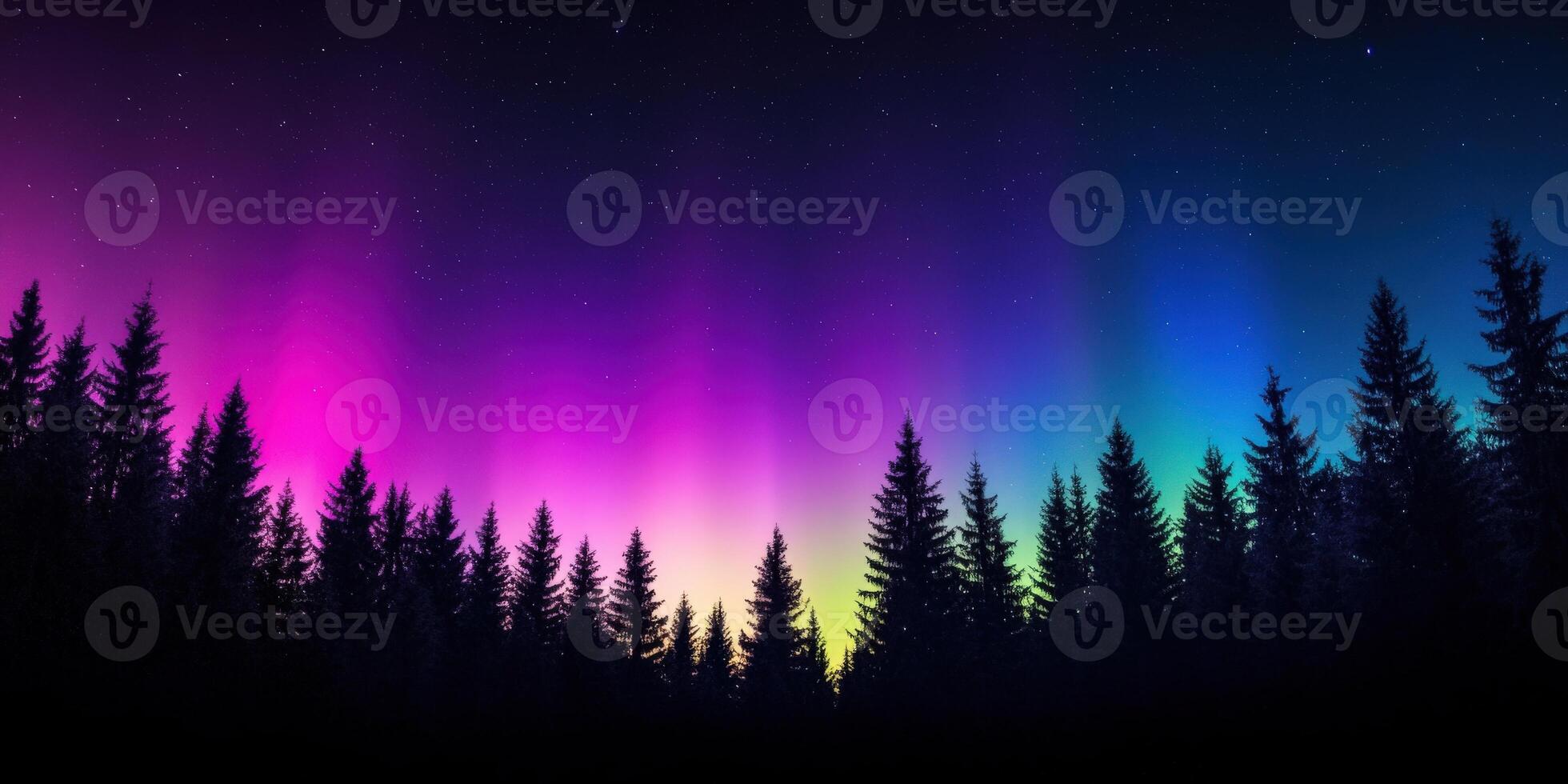 Colorful aurora borealis shines over a forest landscape photo