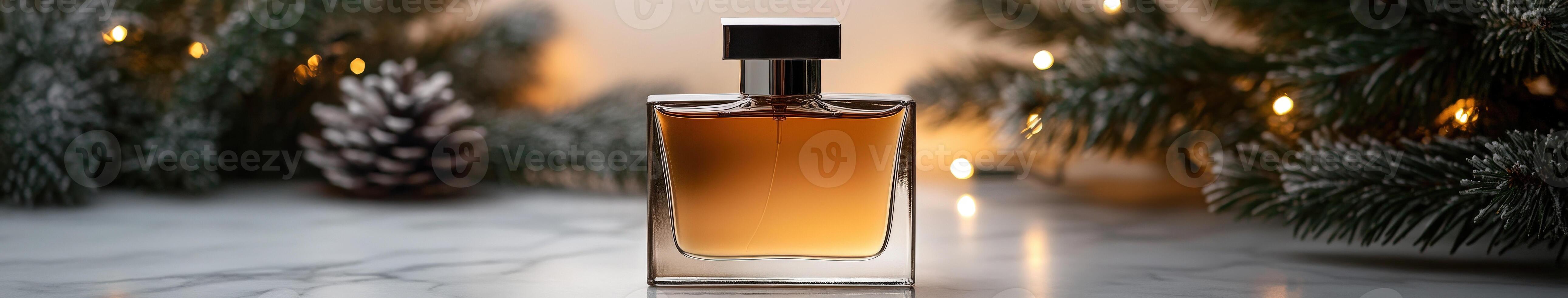 Elegant perfume bottle on a marble surface with greenery photo