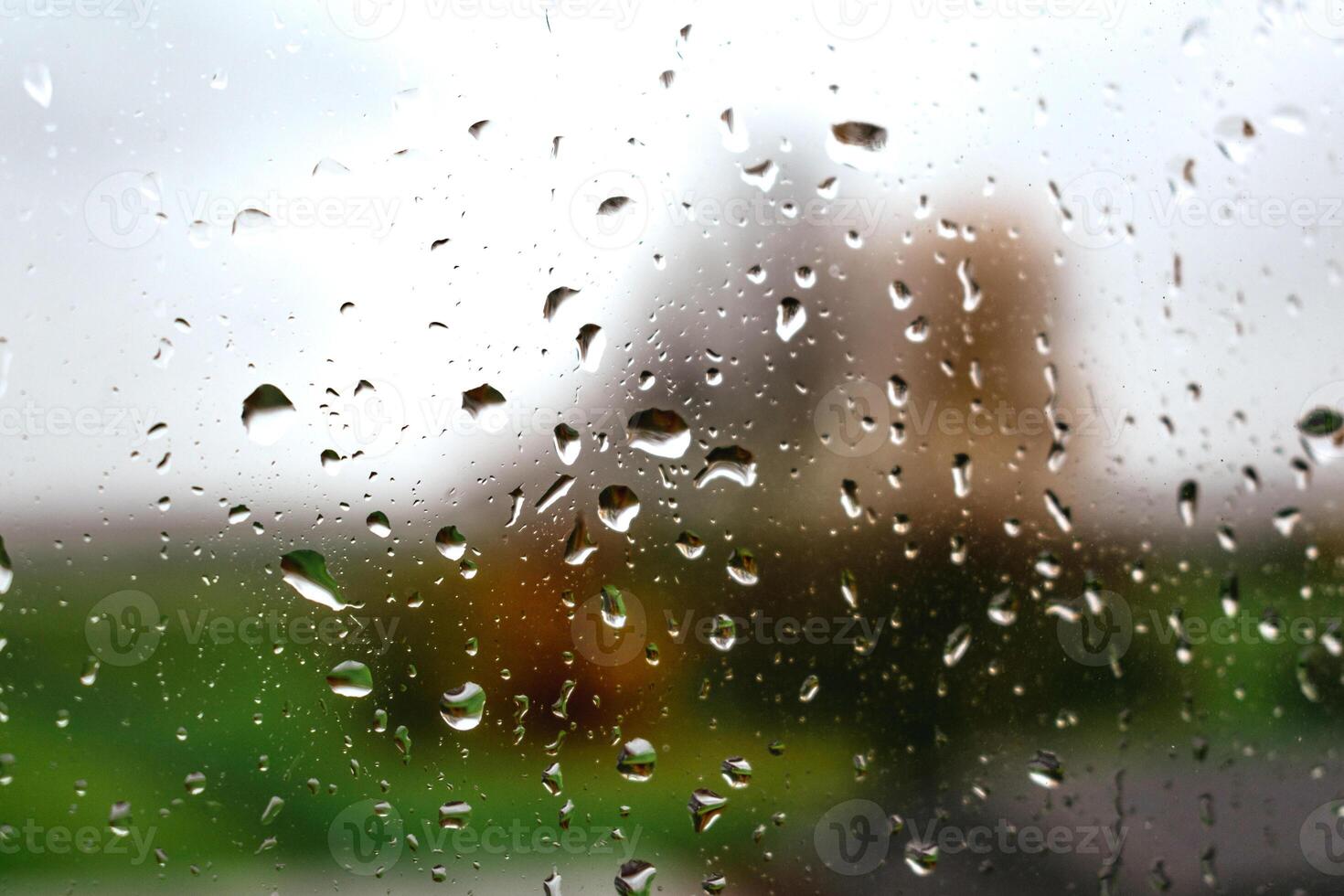 Drops on a window with a beautiful background photo