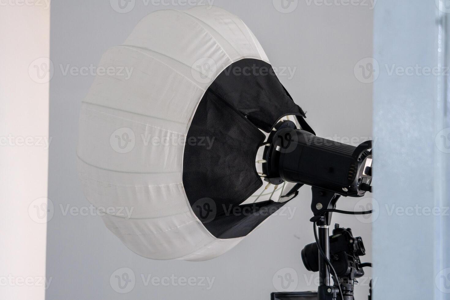 A beautiful lighting lantern placed in a photography studio, casting soft light and creating a warm and inviting atmosphere for creative photo shoots and studio sessions
