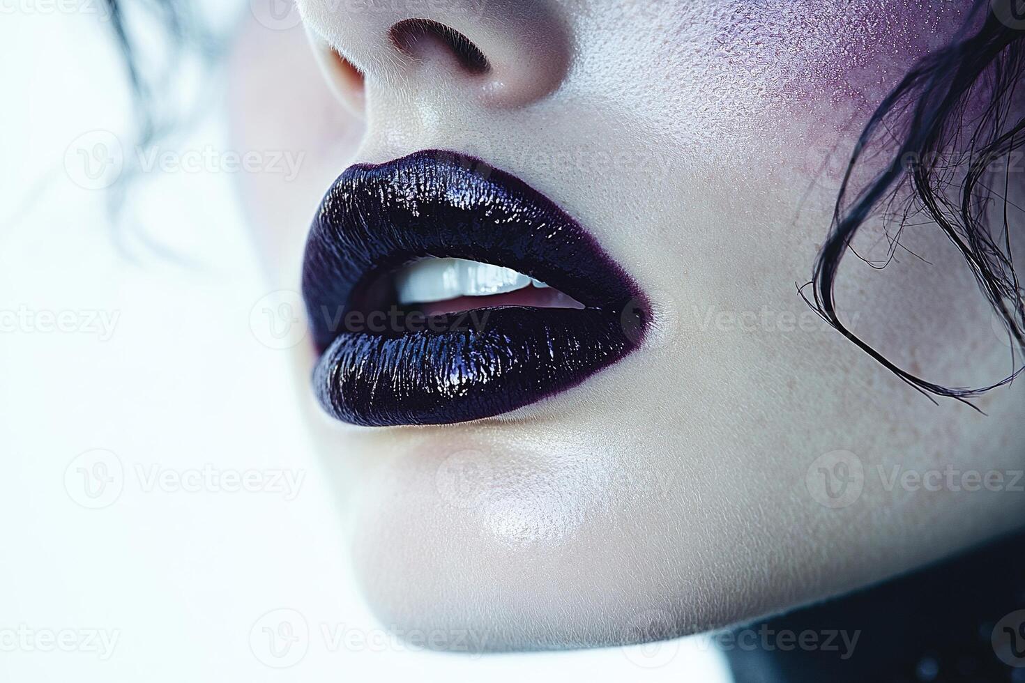 Extreme Close-up of Dramatic Deep Purple Black Lipstick with Metallic Sheen photo