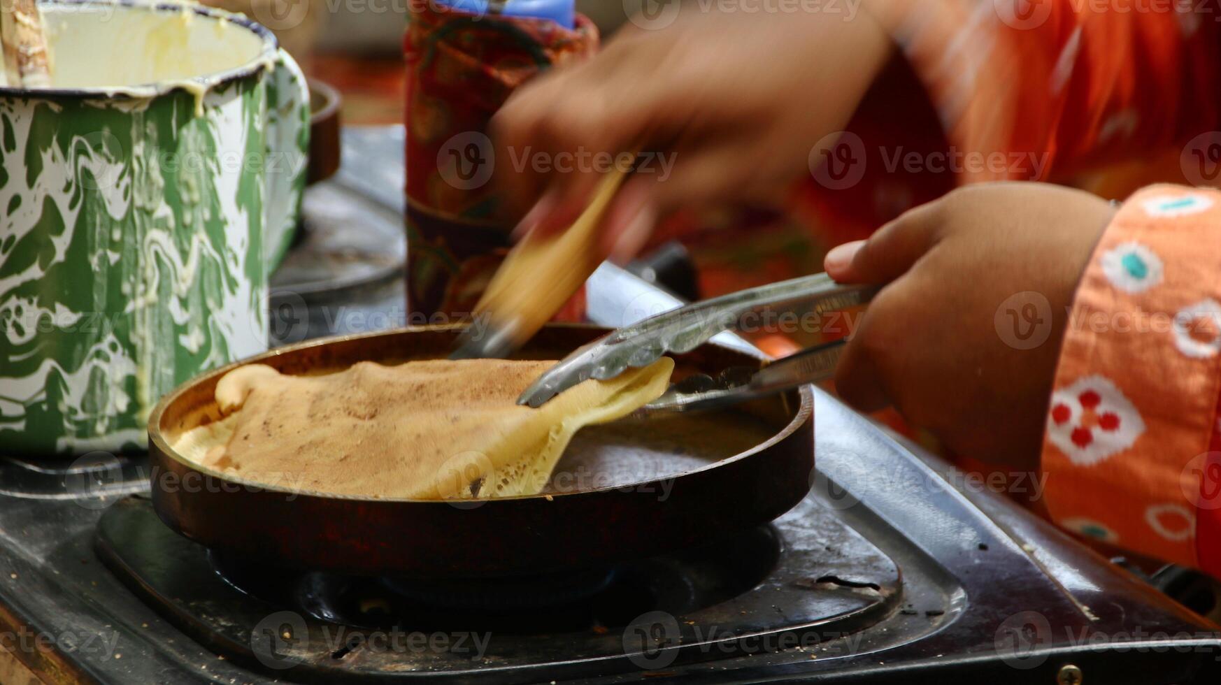 Make Leker cakes, a type of crepes, Indonesian traditional snacks photo