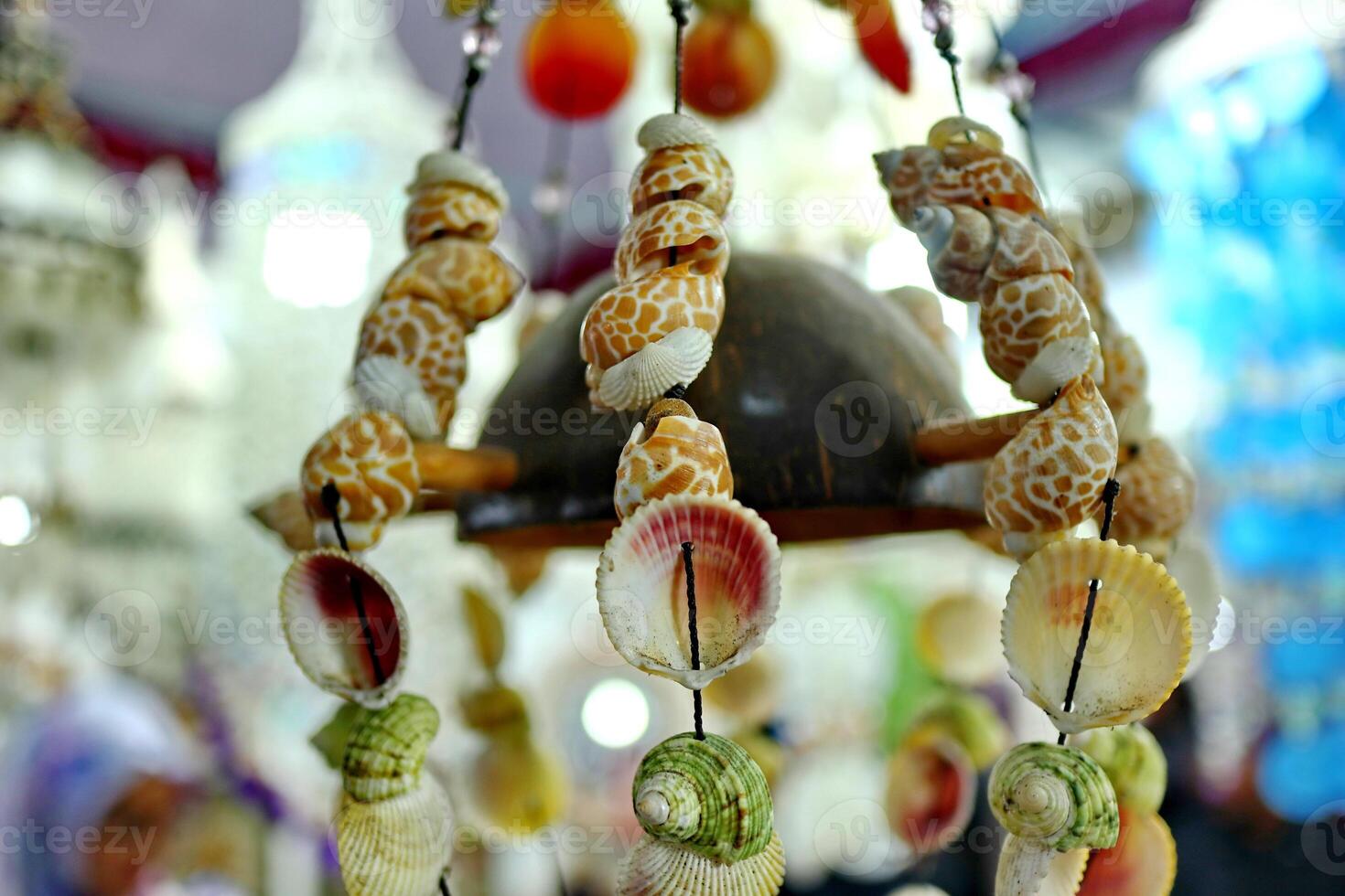 Handmade souvenir decorated with different sea shells photo