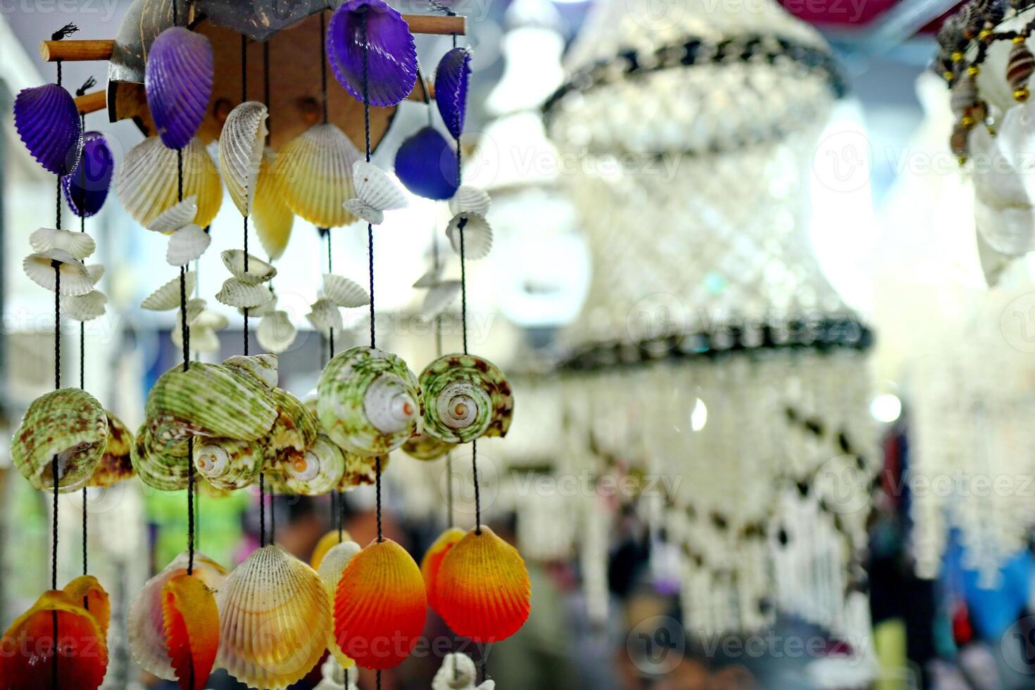 Handmade souvenir decorated with different sea shells photo