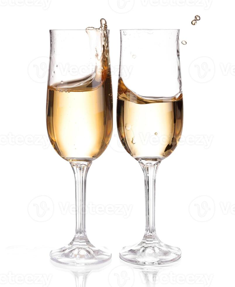 Champagne in a glass. Isolated on white background photo