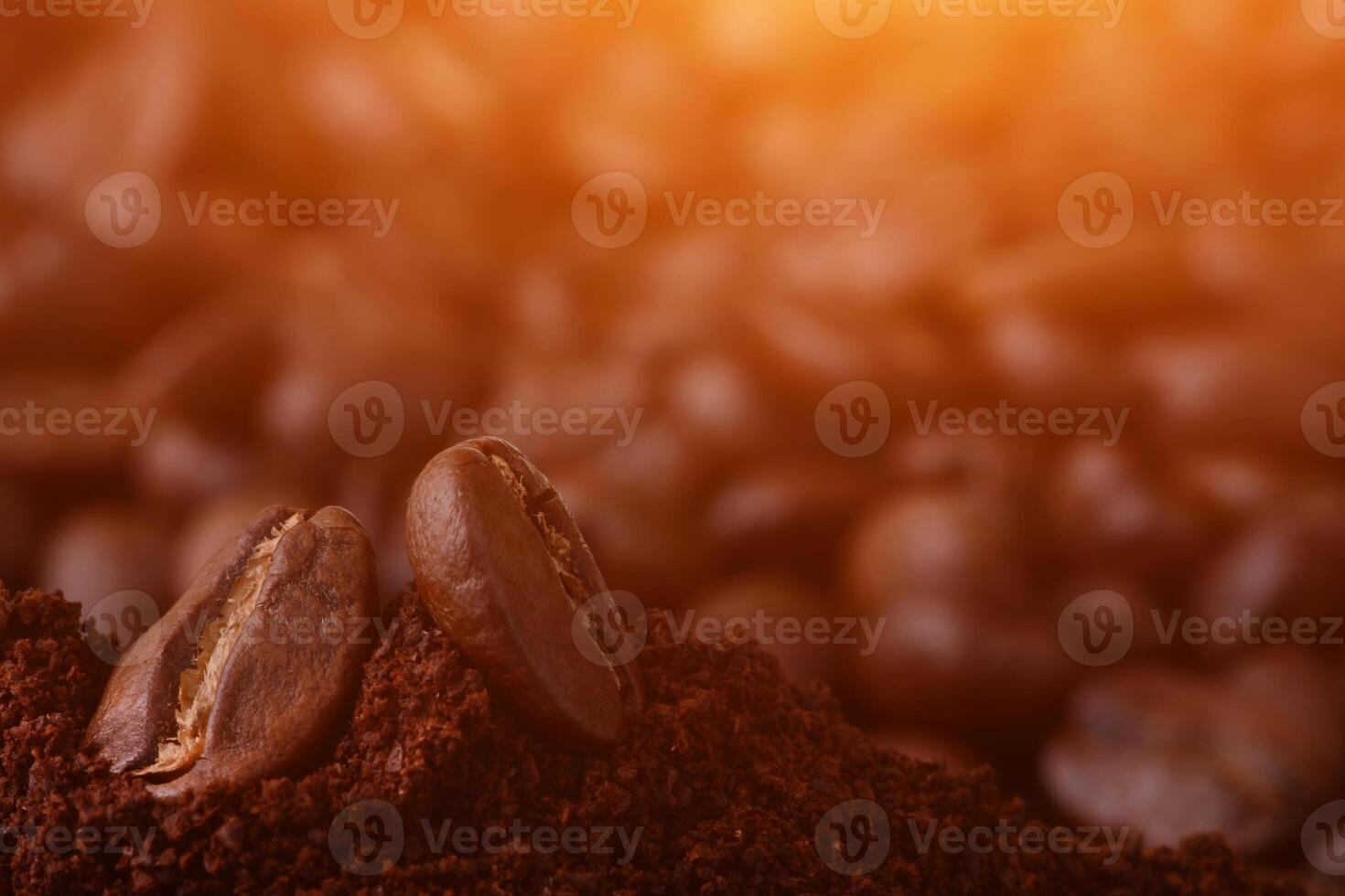 Closeup of coffee beans at roasted coffee heap. photo