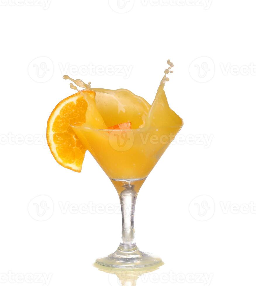 Orange cocktail with splashes. photo