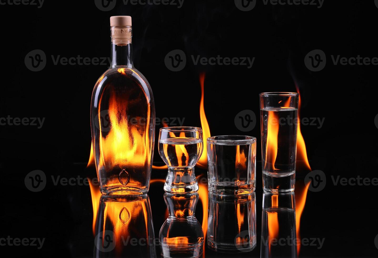 Stack of tequila on fire photo