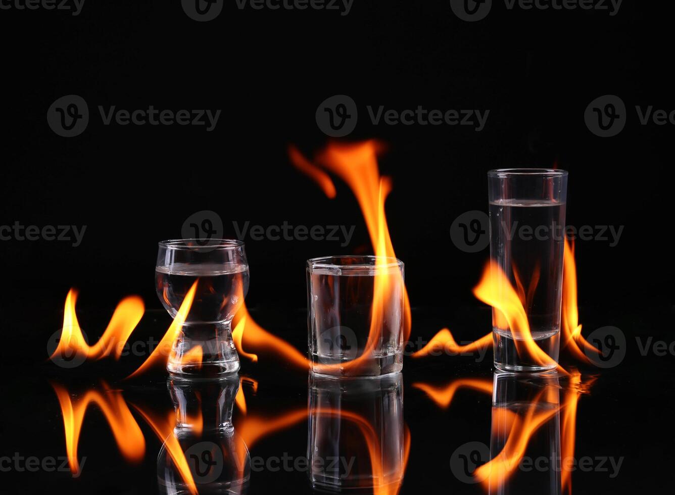 Stack of tequila on fire photo
