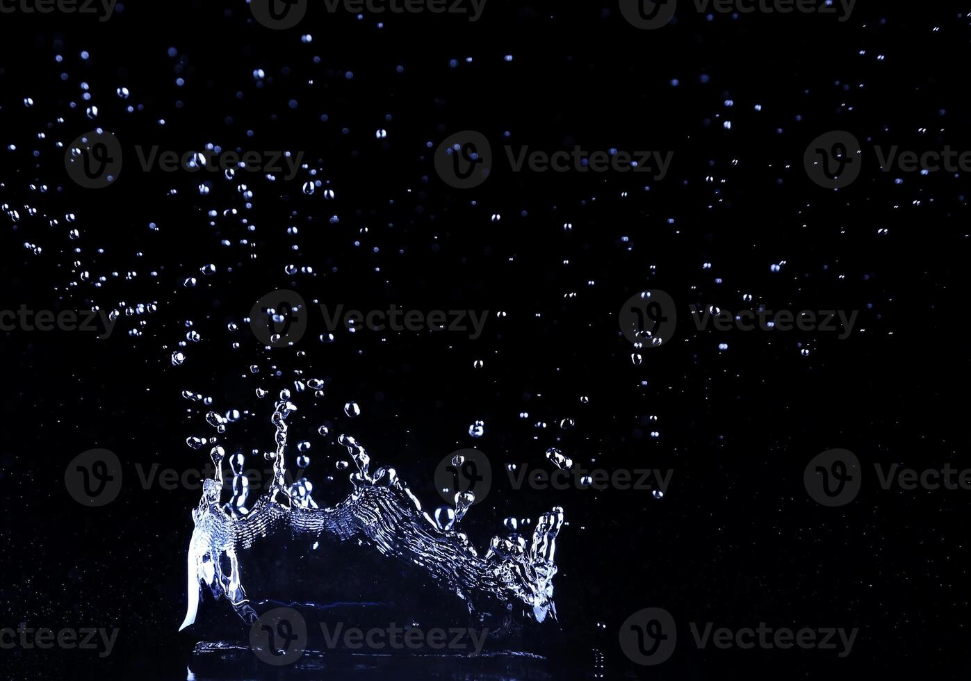 brilliant drops transparent water on black background photo