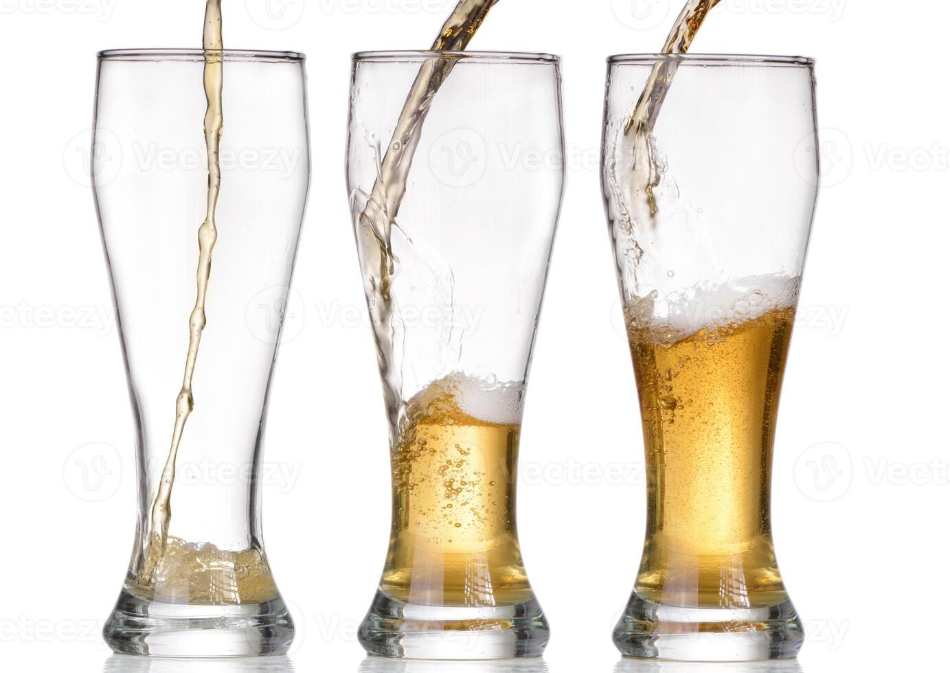 Isolated Glass and Brown bottle of beer on a white background photo