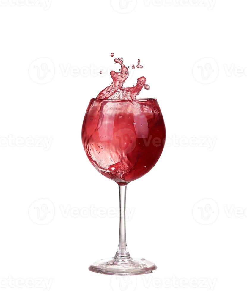 Wine collection - Splashing red wine in a glass. Isolated on white background photo