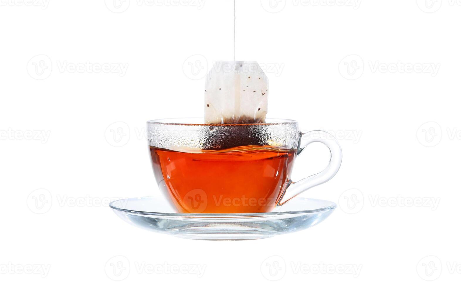 Glass of Tea with Bag End. Isolated on white background, with clipping path photo