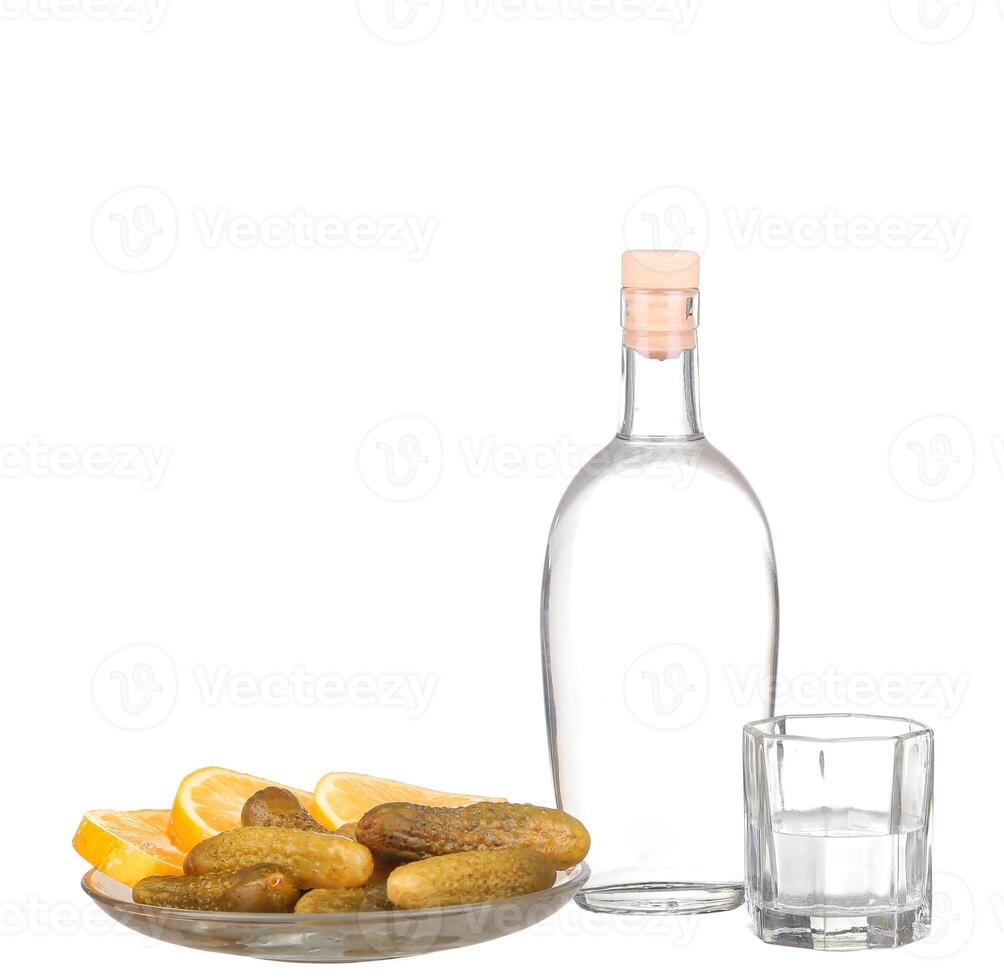 Vodka with the little pickled cucumber. photo