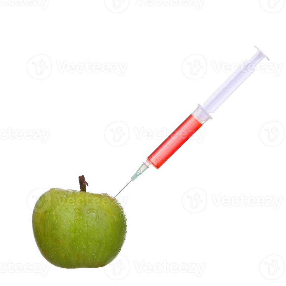 Green fresh apple with syringe on white background , therapy concept photo