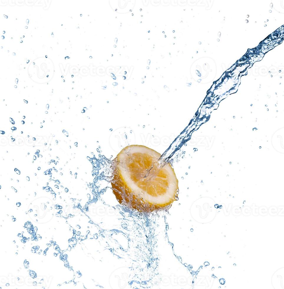 segment of lemon falling in to the water and making splash photo