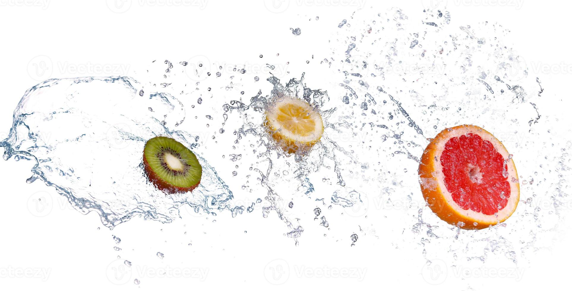 Studio shot of fresh grapefruit with water splash, isolated on white background photo