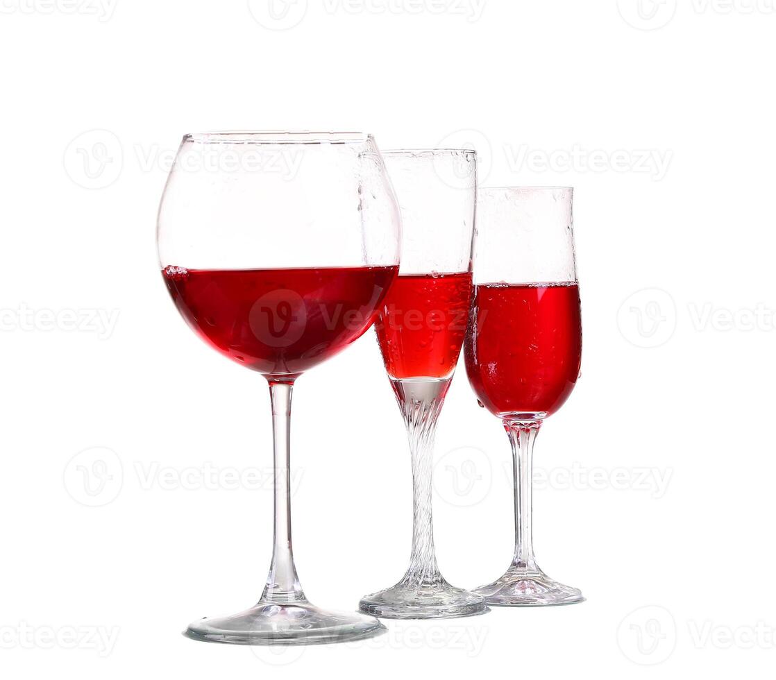 Set of glasses with red wine photo
