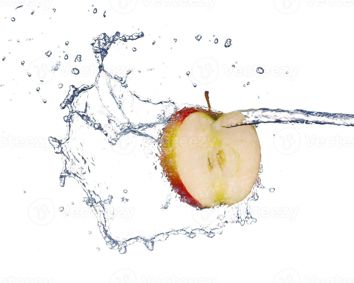 Apple in spray of water. Juicy apple with splash on white background photo