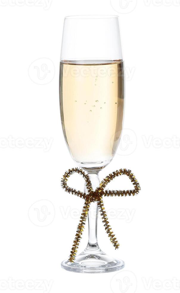 glass with champagne .with a bow Isolated on white with clipping path. photo