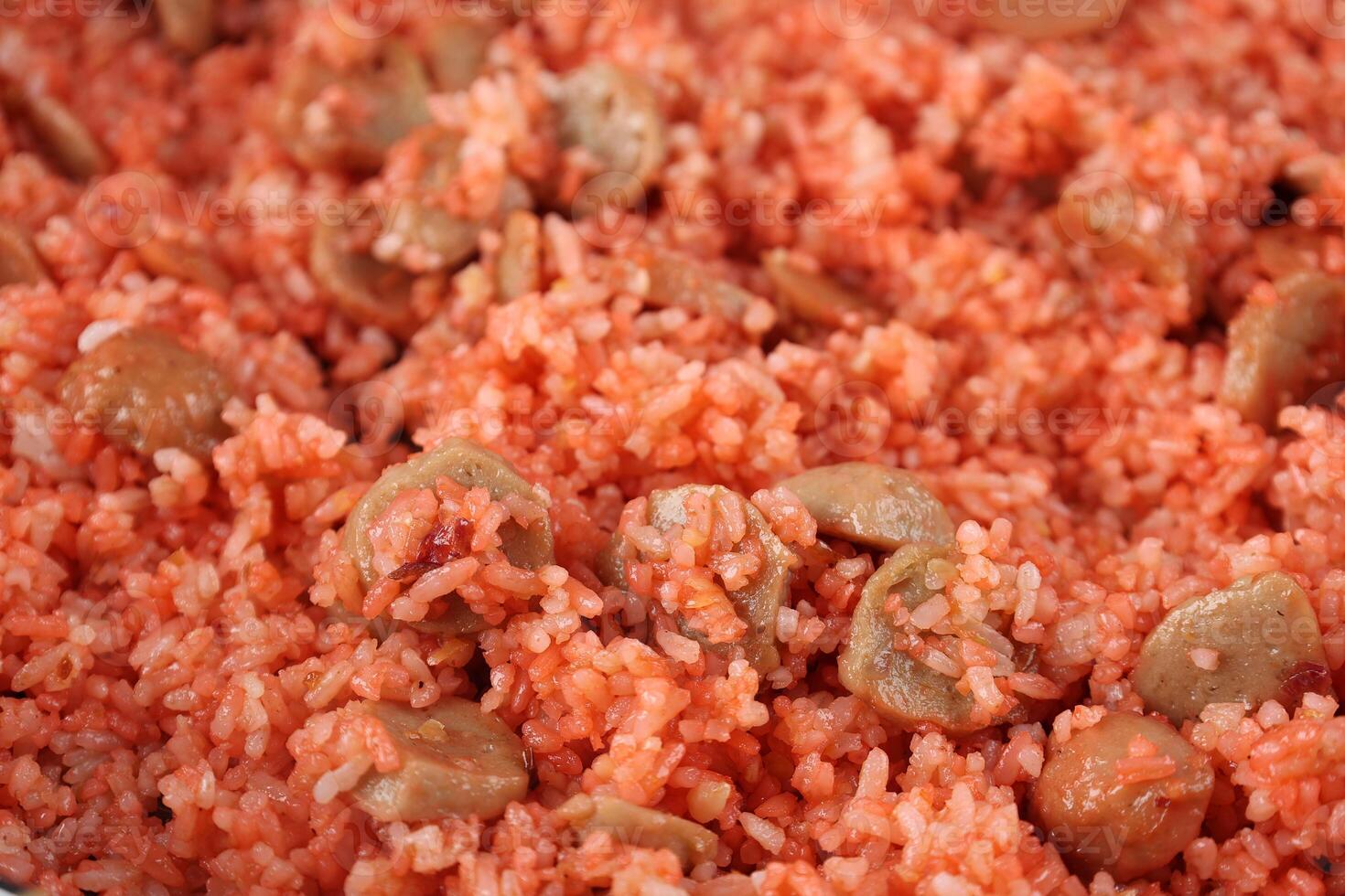 Close Up Texture of Nasi Goreng Merah, Red Fried Rice photo