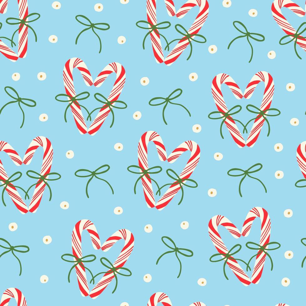 Cute red candy canes with bows, berries and holly plant berries seamless pattern on blue. Holiday season festive background. Elegant design for wrapping paper, fabric. vector