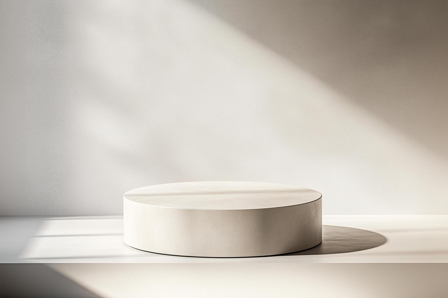 A white round table sitting on a white surface photo