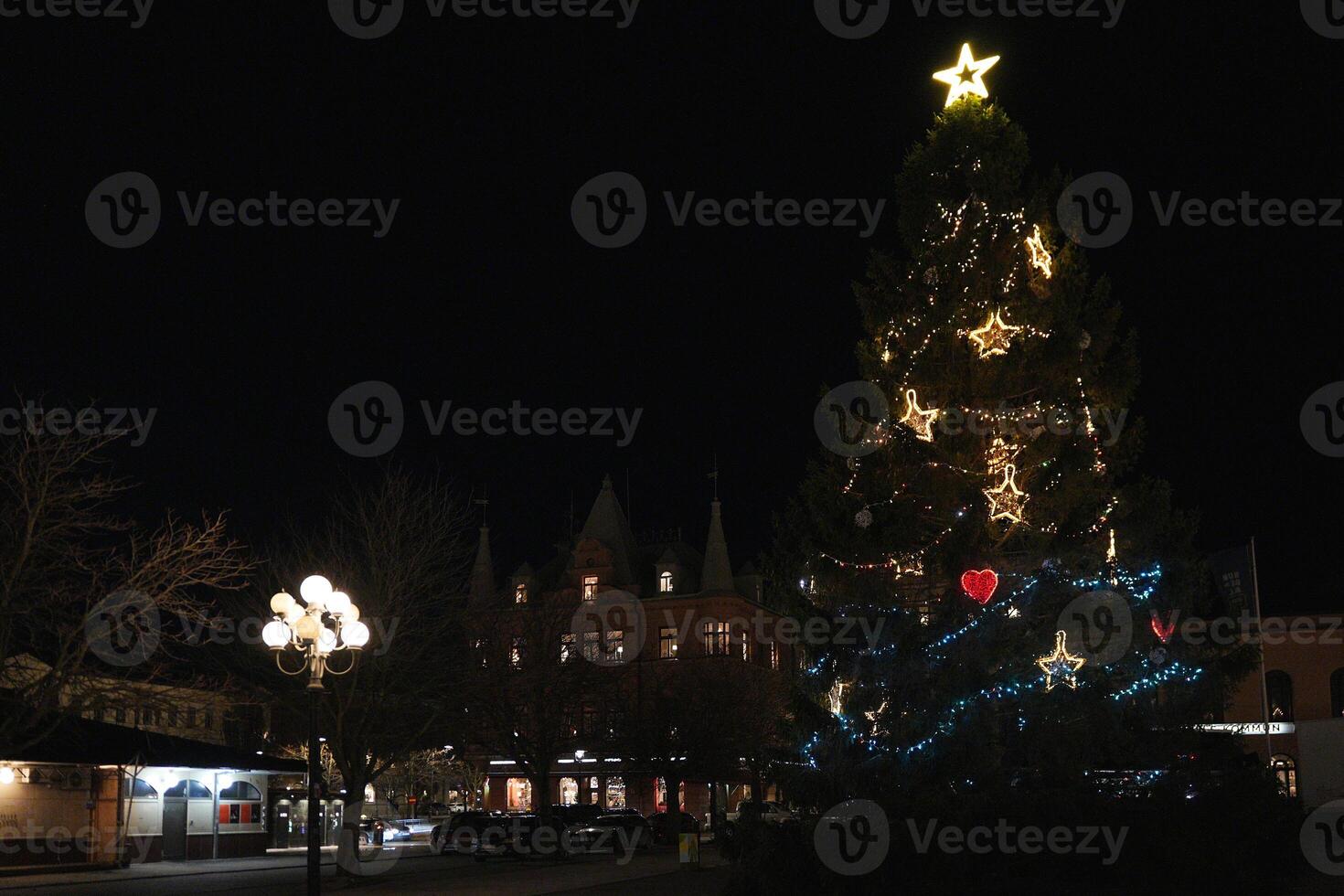 Christmas Tree Illuminated with Star Lights in Sundsvall, Sweden photo