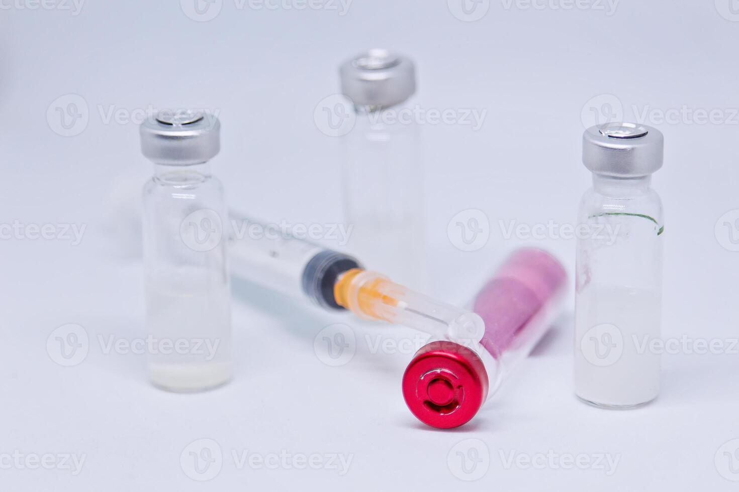 syringe and vials of injectable drugs photo