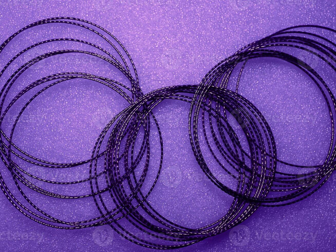 Dark purple circle wire pattern for abstract mysterious background. photo