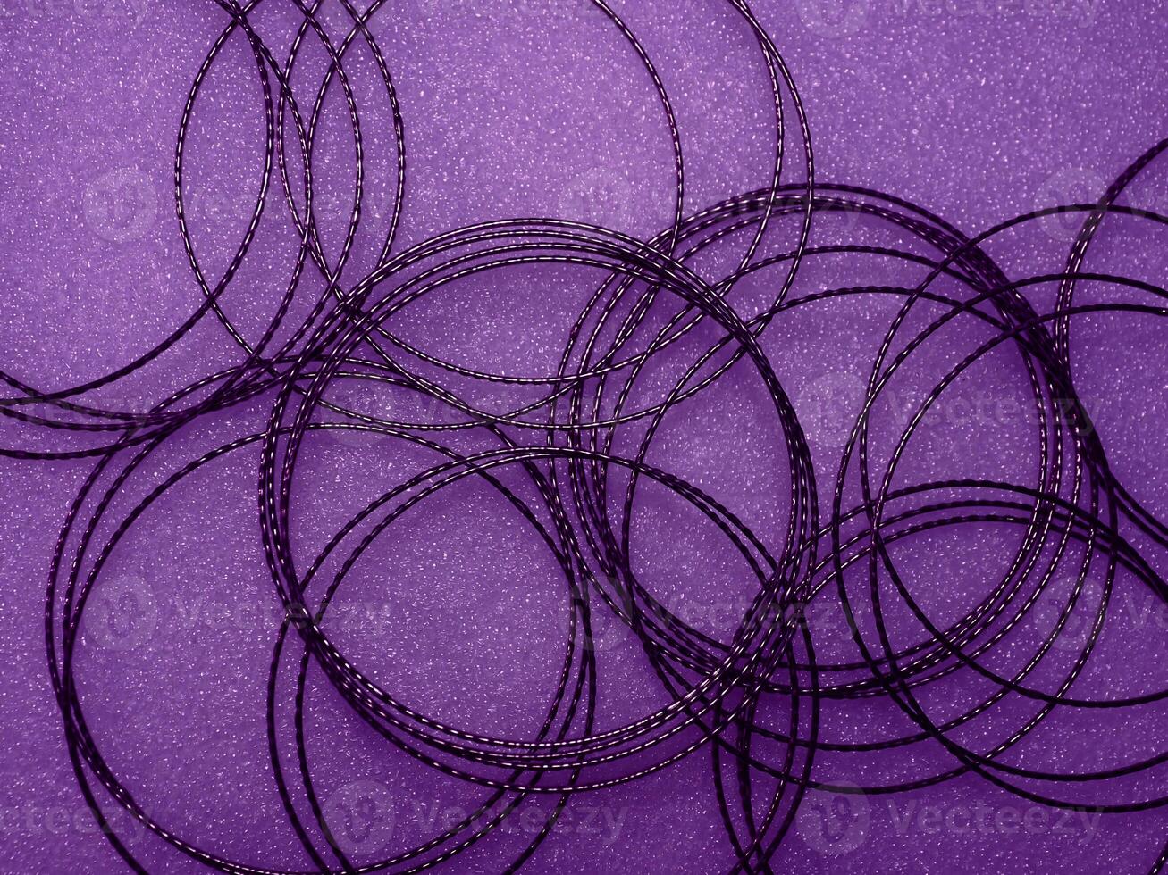 Dark purple circle wire pattern for abstract mysterious background. photo