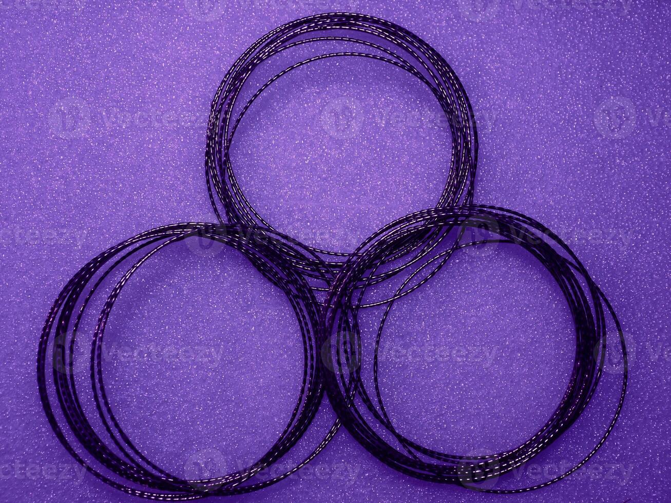 Dark purple circle wire pattern for abstract mysterious background. photo