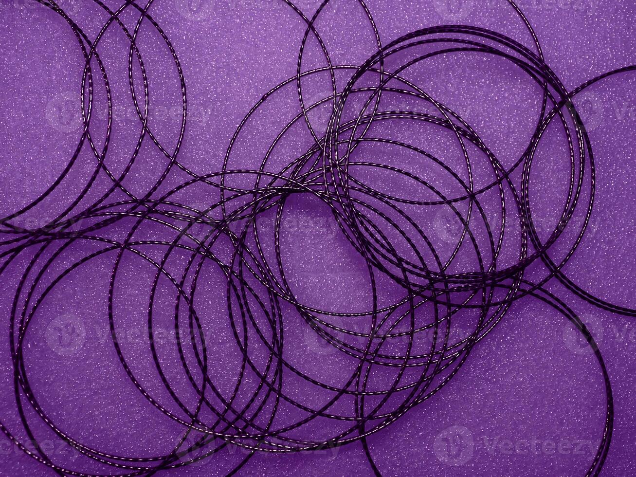 Dark purple circle wire pattern for abstract mysterious background. photo