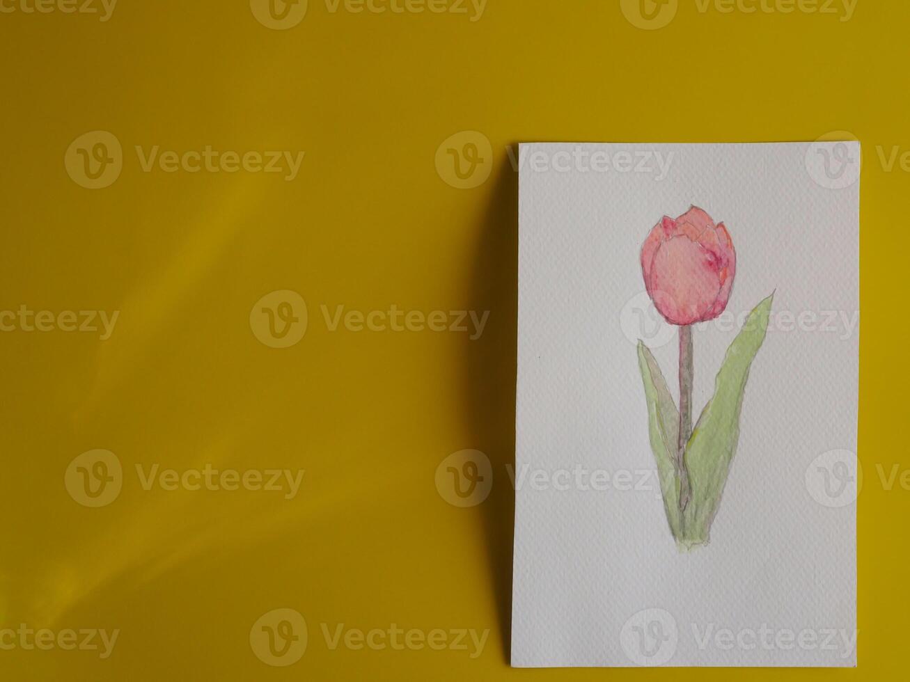 Drawing pastel minimalist pink tulips on paper with yellow background about art education photo
