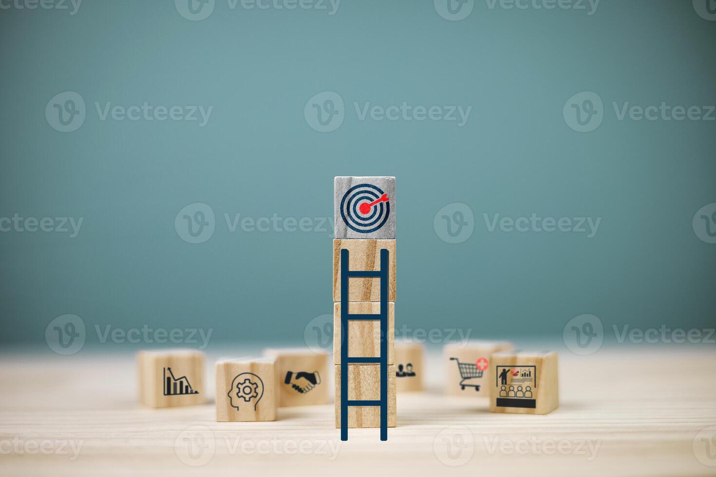 Stairs leading to target board on square wooden blocks. Planning and setting goals concept. photo
