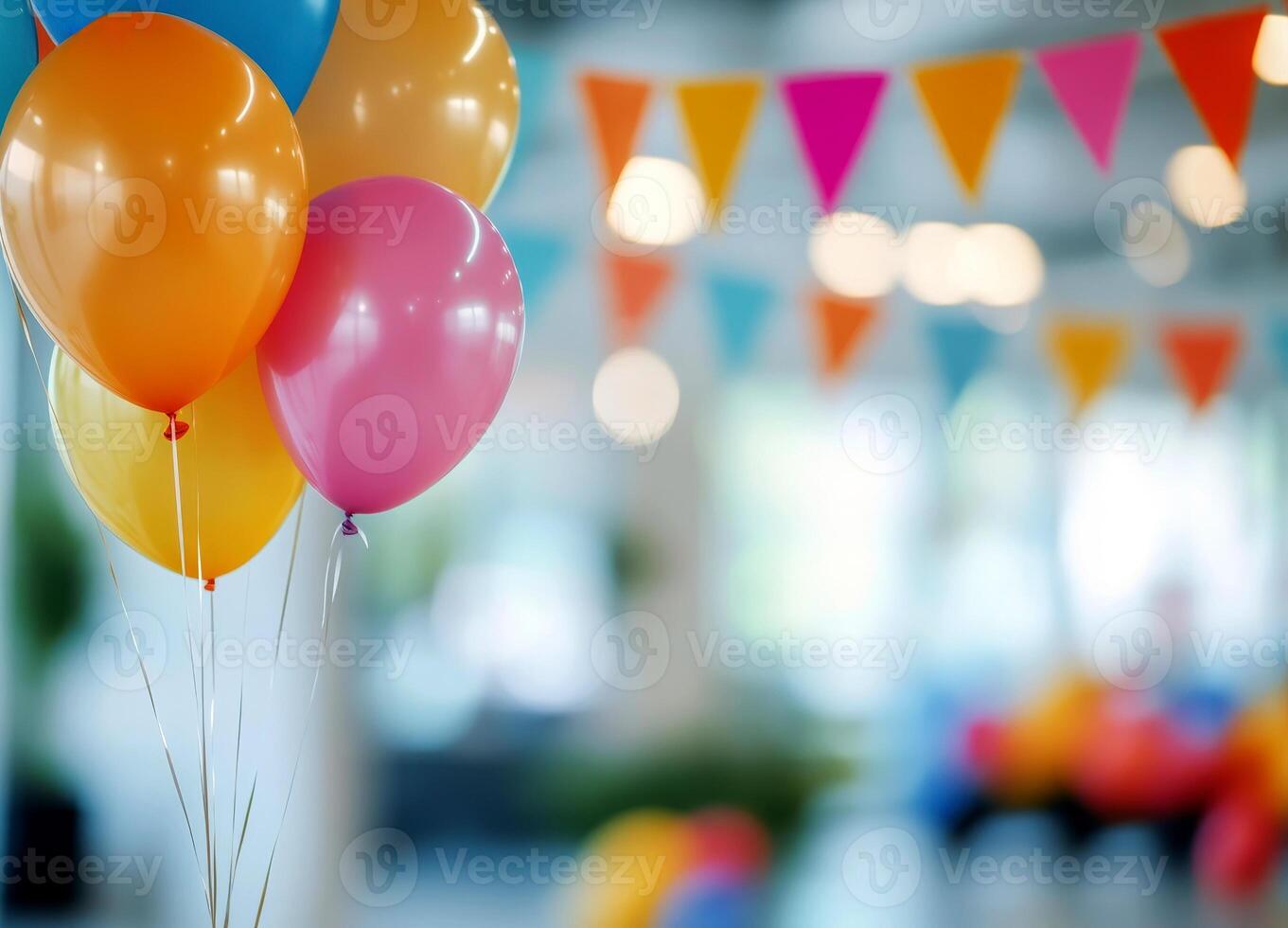 A bunch of colorful balloons in a modern office space with blurred triangle flag background. photo