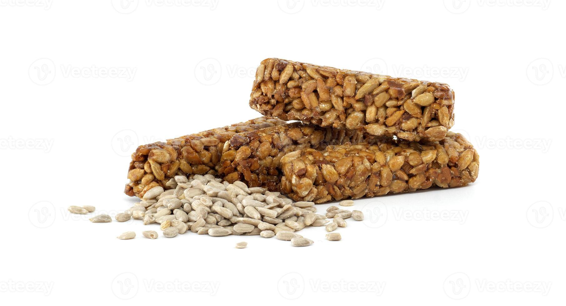 Healthy Granola Bars with Sunflower Seeds on White Background photo