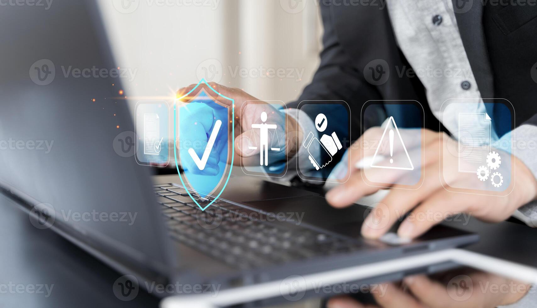 Compliance in business concept. Person use laptop with compliance icon on virtual screen photo