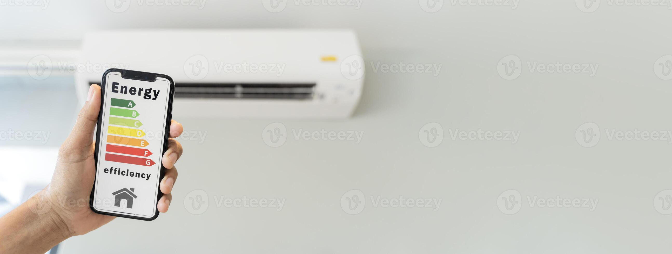 Air conditioner wall mounted decorative. Photo of white air condition hanging on clear wall background under